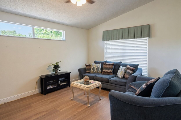 Living area 3, 3BR Pool Home in Kissimmee Sleeps 6, Osceola