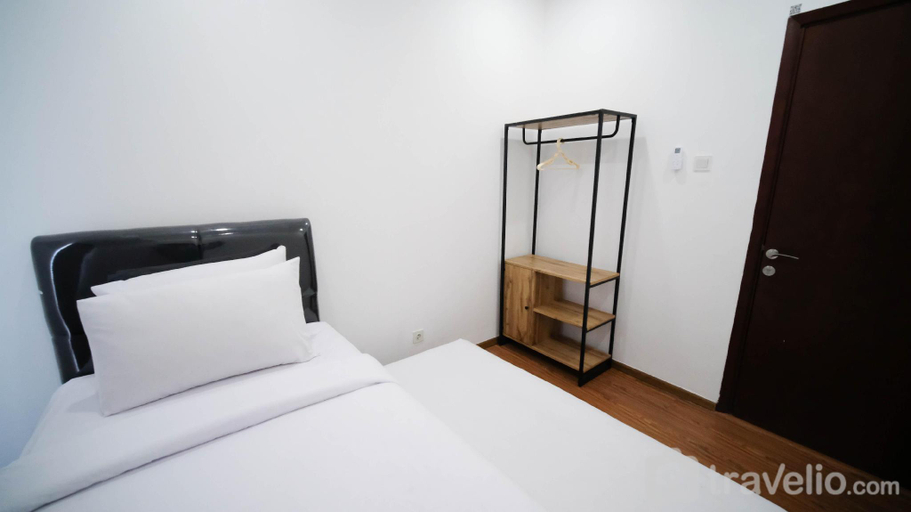 Bedroom 3, Exclusive 3BR at Grand Sungkono Lagoon By Travelio, Surabaya
