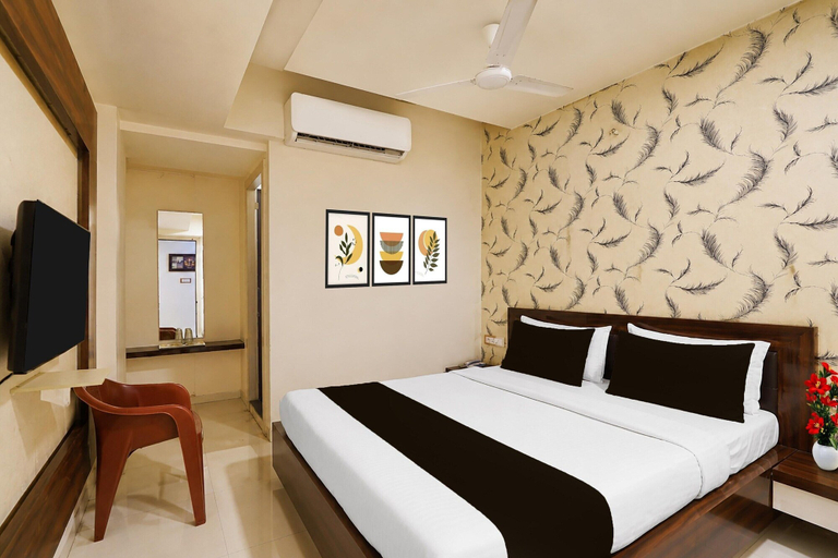 Room 5, Classic Red Apple, Ahmadabad