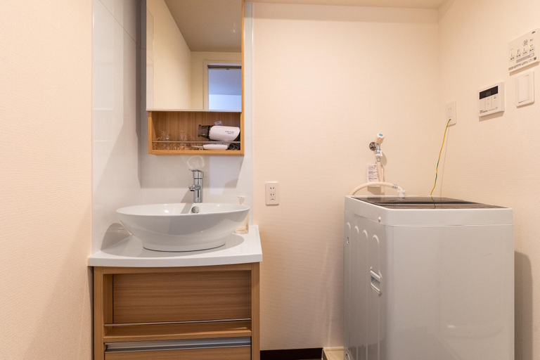 Bathroom 5, Mr.KINJO in front of Manza Beach, Onna