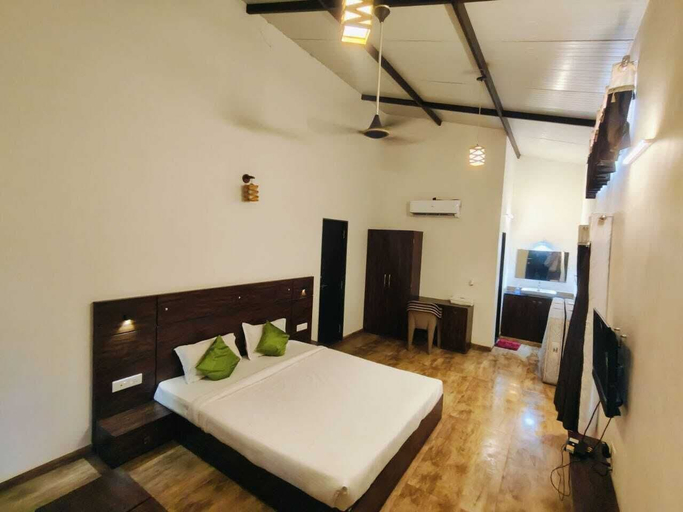 Bedroom 1, Green Heritage Resort, Nashik