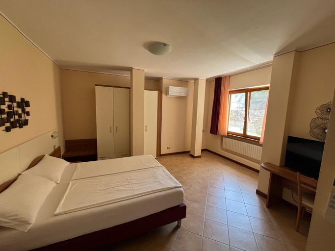 Bedroom 3, Villa Imelda, panoramic apartments with Lake Garda views, Brescia