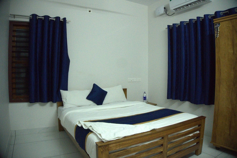 Room 5, Pop Tavern Nakshatra Apartments, Thiruvananthapuram