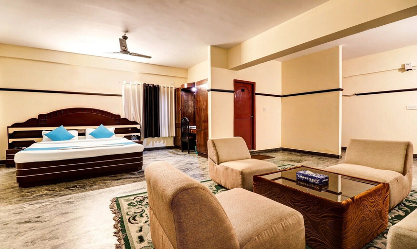 Room 5, Hotel Rvees Regency, Thrissur