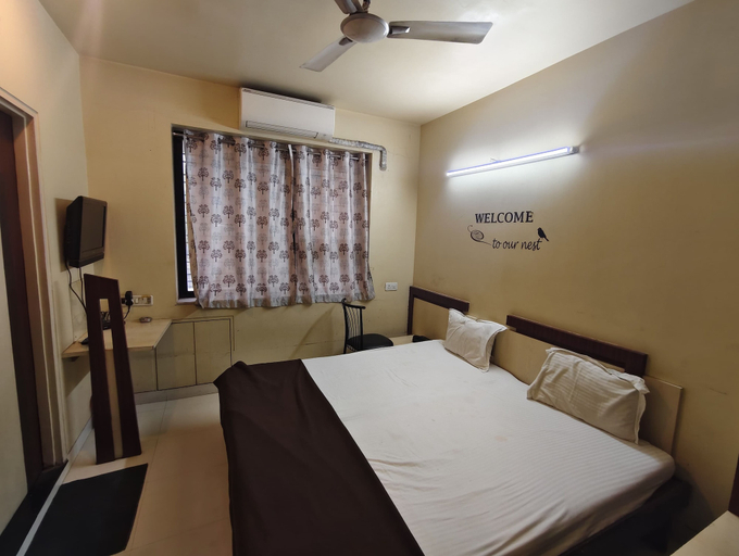 Bedroom 4, Hotel Samrat, Nashik