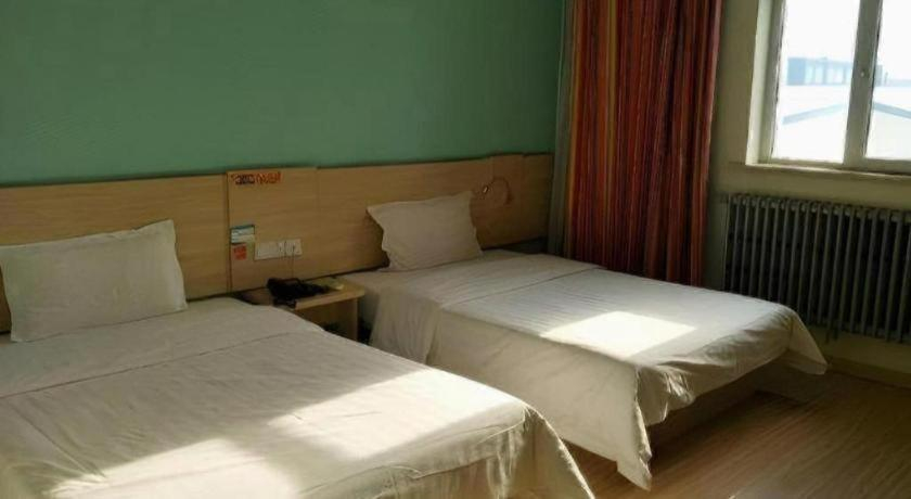 Bedroom 2, 7Days Inn Tianjin Dongli Development Zone Light Railway Station, Tianjin