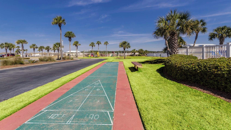 Sport court 5, 2BR Beachfront Condo w Private Beach, Pools, Tennis + Free Attraction Tix!, Bay