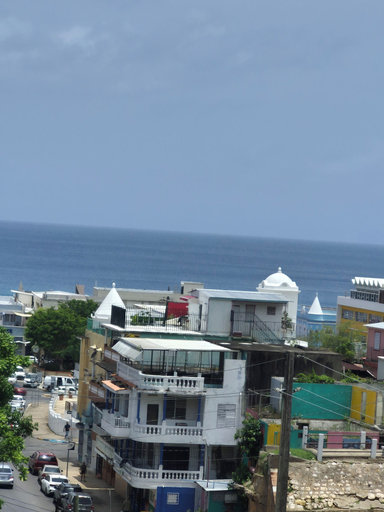 Exterior 2, Charming 3-bedroom Apartment With Ocean and Mountain Views