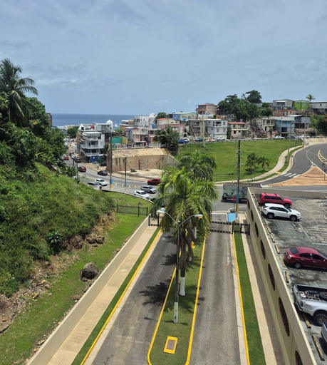 Aerial view, Charming 3-bedroom Apartment With Ocean and Mountain Views