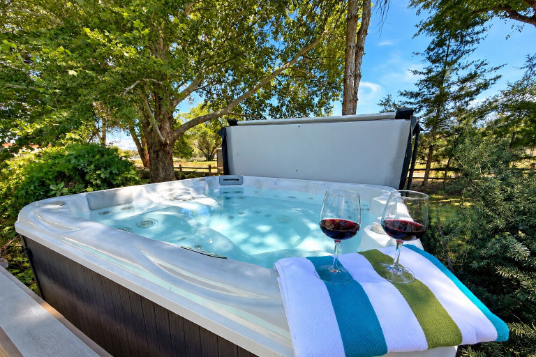 Outdoor spa tub, Orchard Oasis 5 Bedroom Home, Mesa