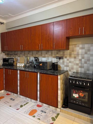 Private kitchen, Naperville Apartments Premium, Kampala