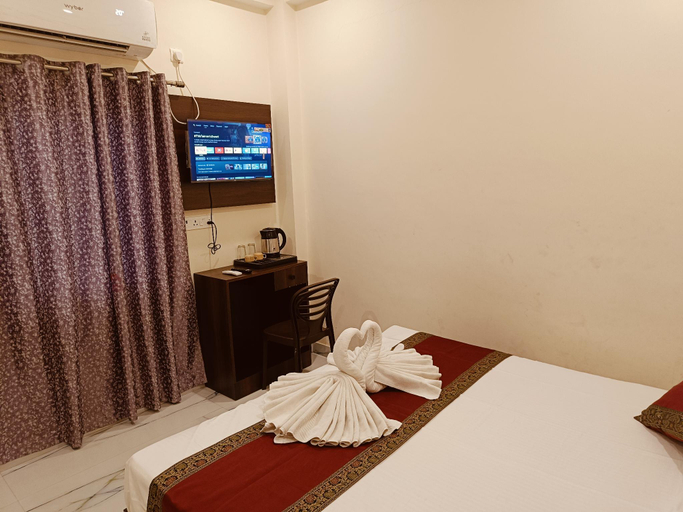 Bed, Mahalaxmi Guest House, Varanasi