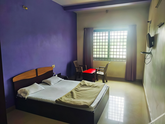 Bedroom 2, Pushpagiri Comforts, Hassan