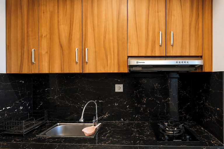 Private kitchen, Modern Breezy Studio At Apartment Tamansari Skylounge Balikpapan, Balikpapan