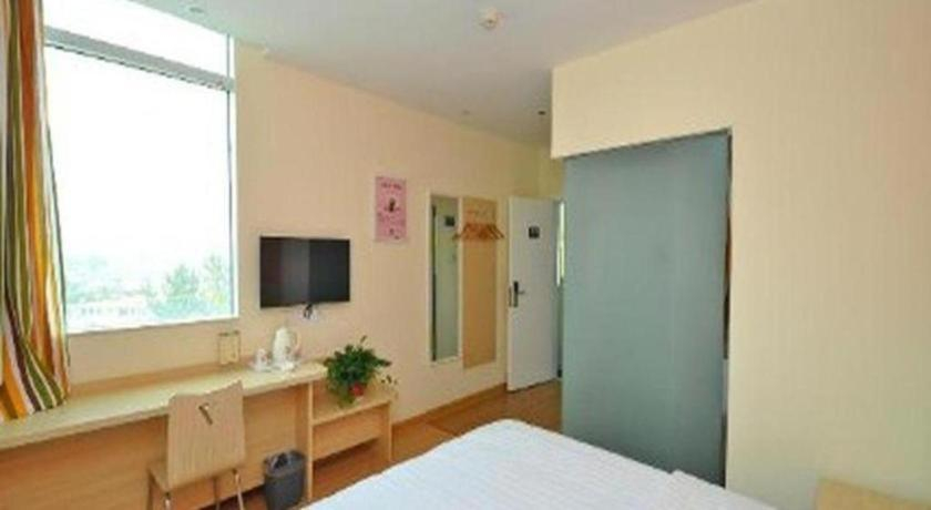 Bedroom 2, 7 Days Inn Zibo Linzi District Tianqi Road Qina Studio, Zibo