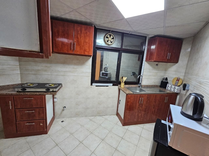 Private kitchen, Spacious 2-Bedroom Apartment, Ajman