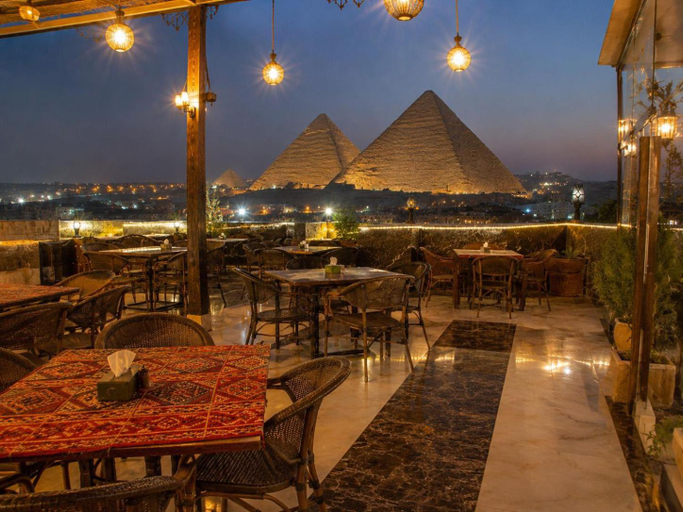 Food & Drinks 4, Malak pyramids, Al-Ahram