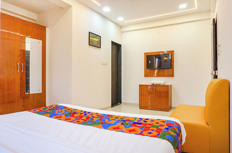 Room 4, RISING SURYA HOTEL, Pune
