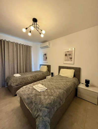 Room 2, Calypso Grand Oasis Xaghra, 3-br Luxury Apartment