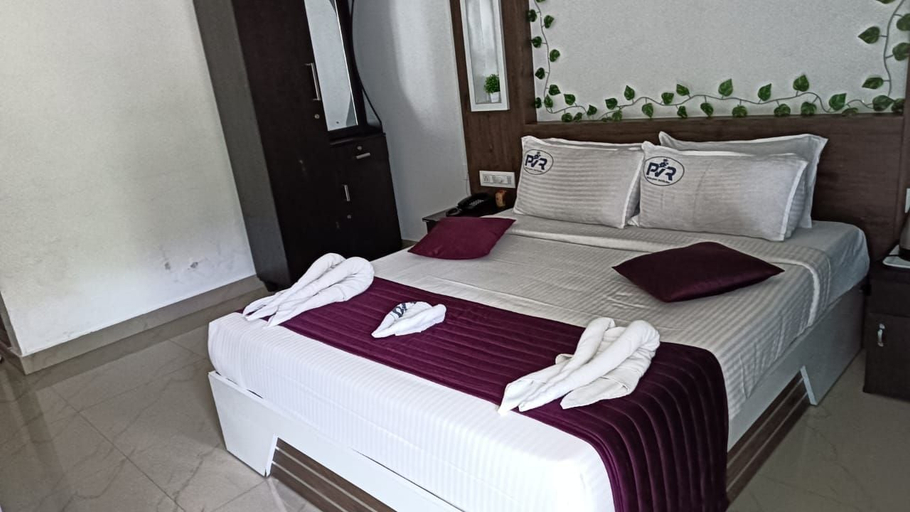 Room 4, Grace Grand Resort Munnar, Idukki