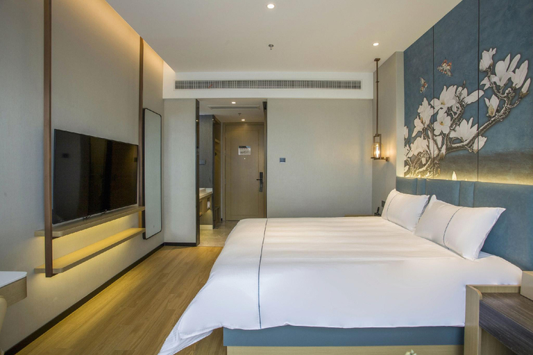 Bedroom 2, Magnotel Business Zhenjiang South Railway Station Greenland Square, Zhenjiang
