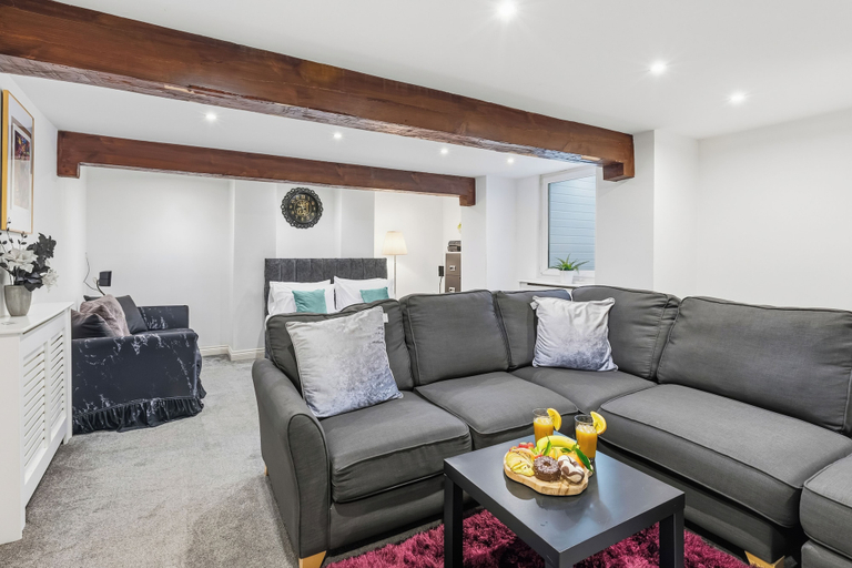 Living area 2, The Cozy Snug Basement, Sleeps 2 in Bury, Bury