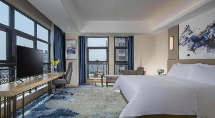 Bedroom 2, Vienna Hotel Shaanxi Hanzhong Central Square High-Speed Railway Station, Hanzhong