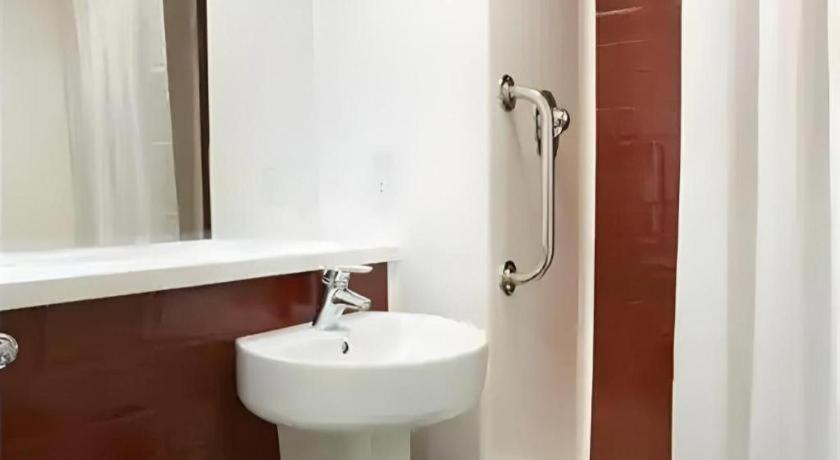 Bathroom 3, Travelodge Chichester Central, West Sussex