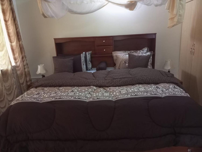 Bedroom 2, Captivating 3-Bed Villa, Busiiro
