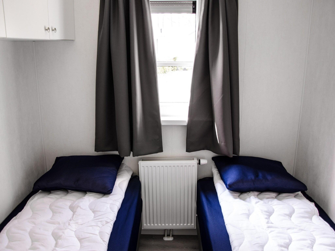 Bedroom, Chalet by Pond with Terrace Views, Steenwijkerland