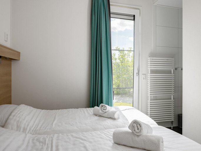 Bedroom 3, Lodge in Zeebad near the Beach, Sluis