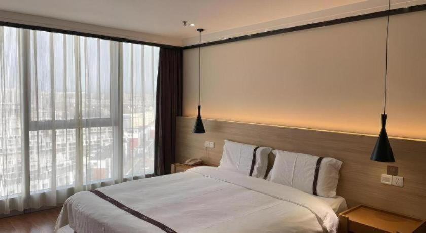 Bedroom 1, Gya Hotel Tangshan Qian'an Fortune Center, Tangshan