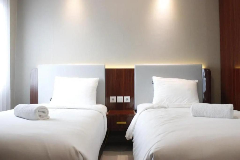 Bedroom 2, Deluxe 2BR at The Greko Apartment By Travelio, Bandung