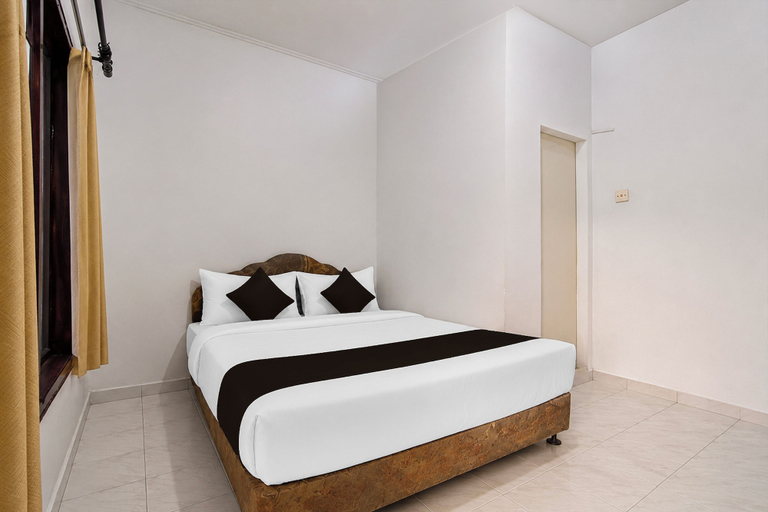 Room 4, Hotel O near RS Awal Bros Sudirman, Pekanbaru