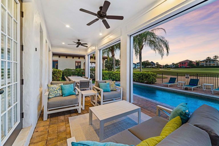 Outdoor dining 3, Polished Villa With Home Theater at Reunion, Osceola