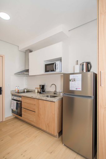 Private kitchen 3, 2BR at First del Sol Modern & Stylish, Asunción