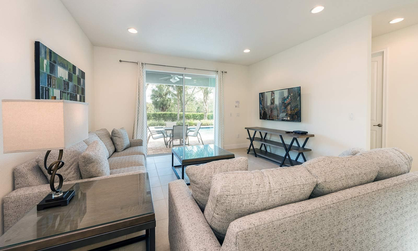 Living area 3, Spacious Retreat With Themed Bedrooms in Encore, Osceola