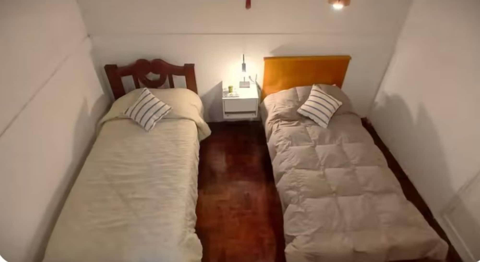 Room 5, Serena Suipacha, Capital