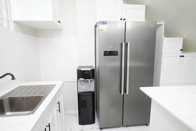 Private kitchen, Luxurious Place 2BR Entire House With Wifi Near SM Lucena, Lucena City
