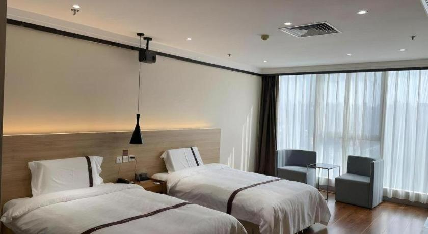 Bedroom 2, Gya Hotel Tangshan Qian'an Fortune Center, Tangshan