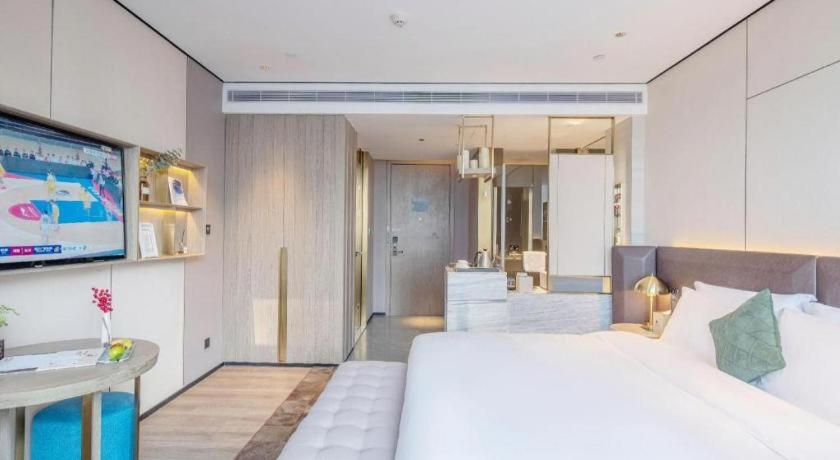 Bedroom 2, Echarm Plus Hotel Hangzhou Binjiang Xingguang Avenue, Hangzhou