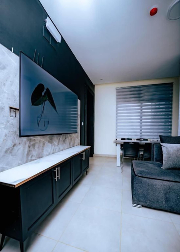 Living area 5, Negocios Apartment, Gasabo