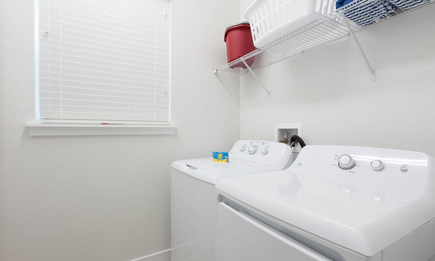 Laundry, Modern 6 Bedroom Home With Upscale Living at Reunion, Osceola
