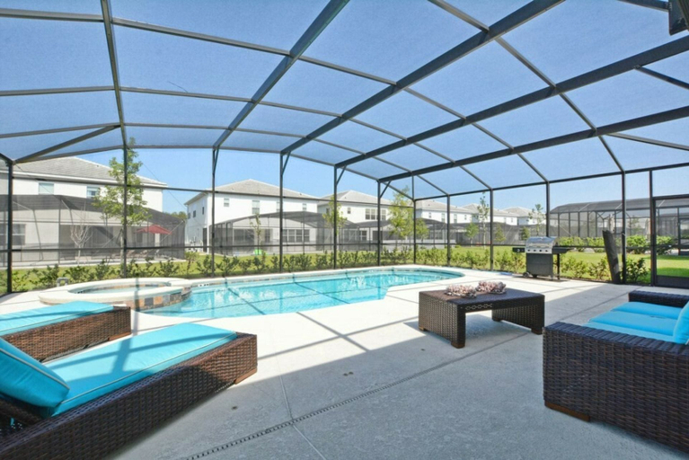 Terrace/patio, 7BR Near Disney Private Pool, Spa, Game Room, Osceola