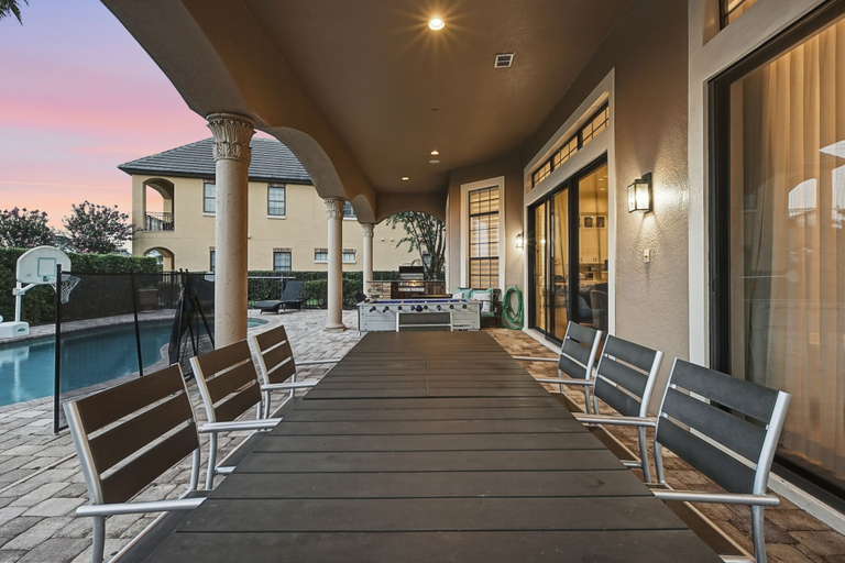 Outdoor dining 5, Upscale Oasis With Home Theater at Reunion, Osceola