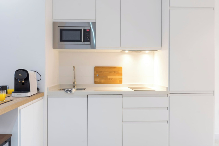 Private kitchen 4, Housing Ollerias by Sharingco, Málaga