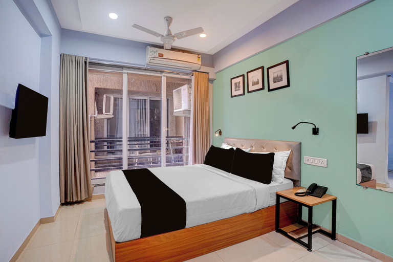 Room 4, Collection O Bhumi World Industrial, Thane