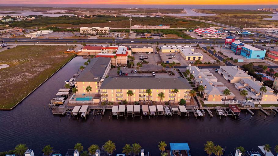 Aerial view 3, Paradise Found by Avantstay Waterfront Retreat Private Boat Slip + Shared Pool North Padre, Nueces