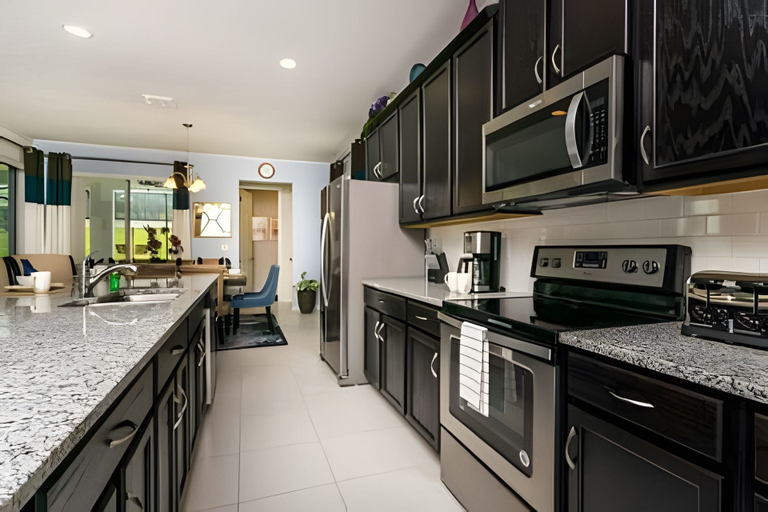 Private kitchen 4, Disney 6BR Villa w/ Pool & Themed Rooms, Osceola