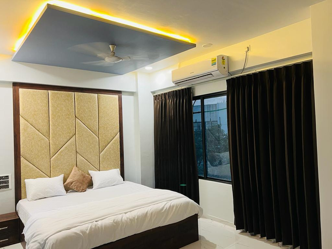 Bedroom 4, Hotel New City Light, Surat